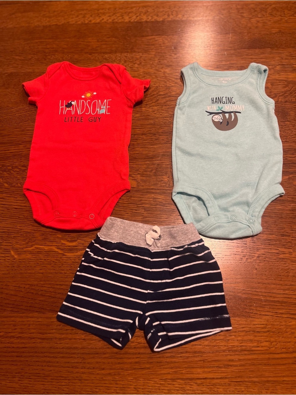 Carter's size 3m 2piece Bodysuits and shorts hanging with mommy